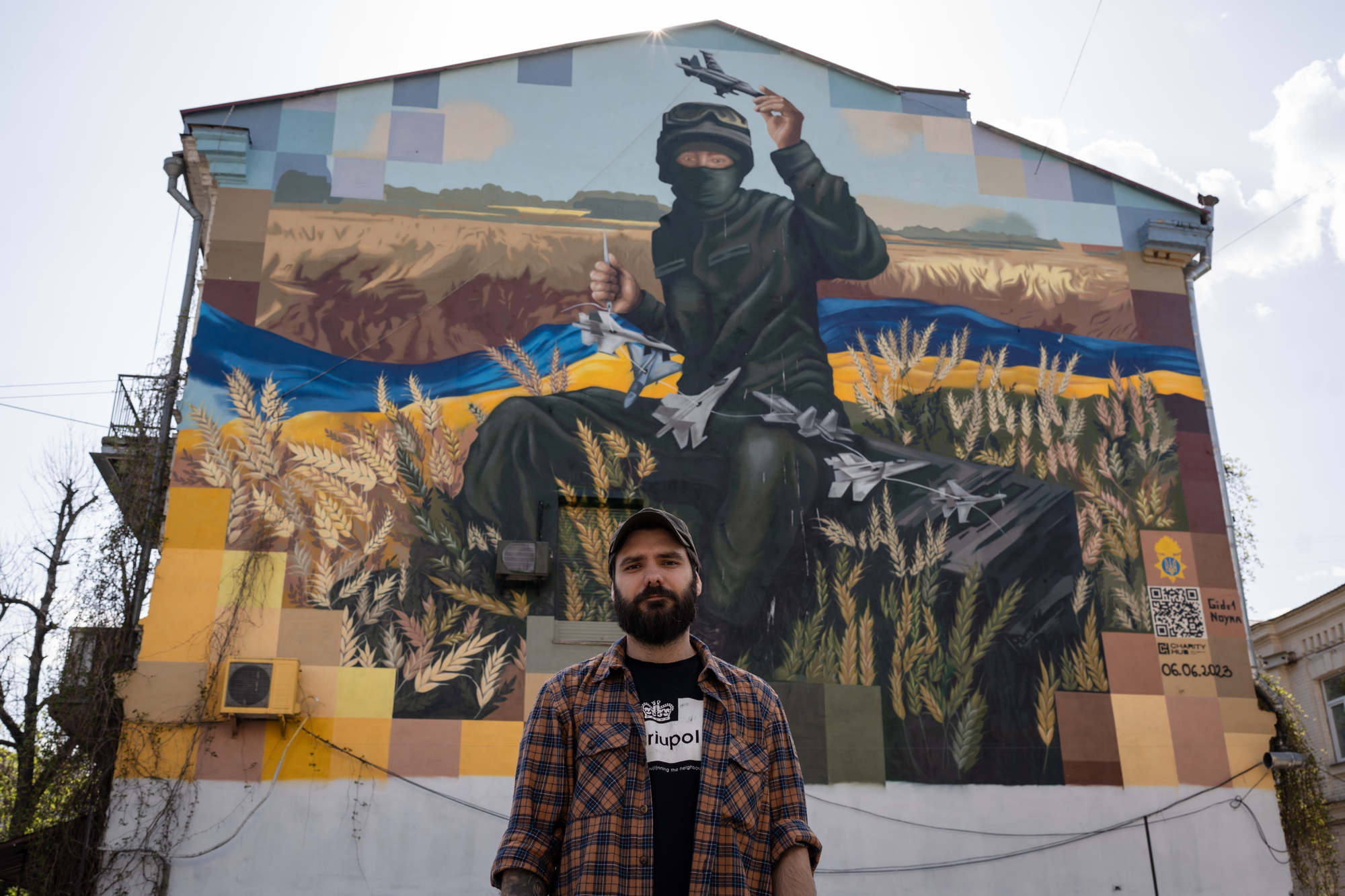 卸下軍裝、換上素衣的克羅特維奇（Bohdan Krotevych），在基輔受訪當天顯得與常人無異。他說，服役雖已告一段落，作為烏克蘭人的責任與思考，從未停止。（攝影／陳彥婷）