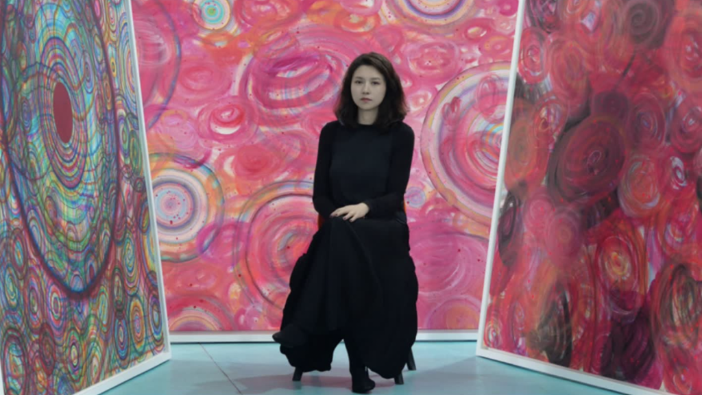 广胜寺下寺后殿元代壁画《炽盛光佛佛会图》下方的供养人图