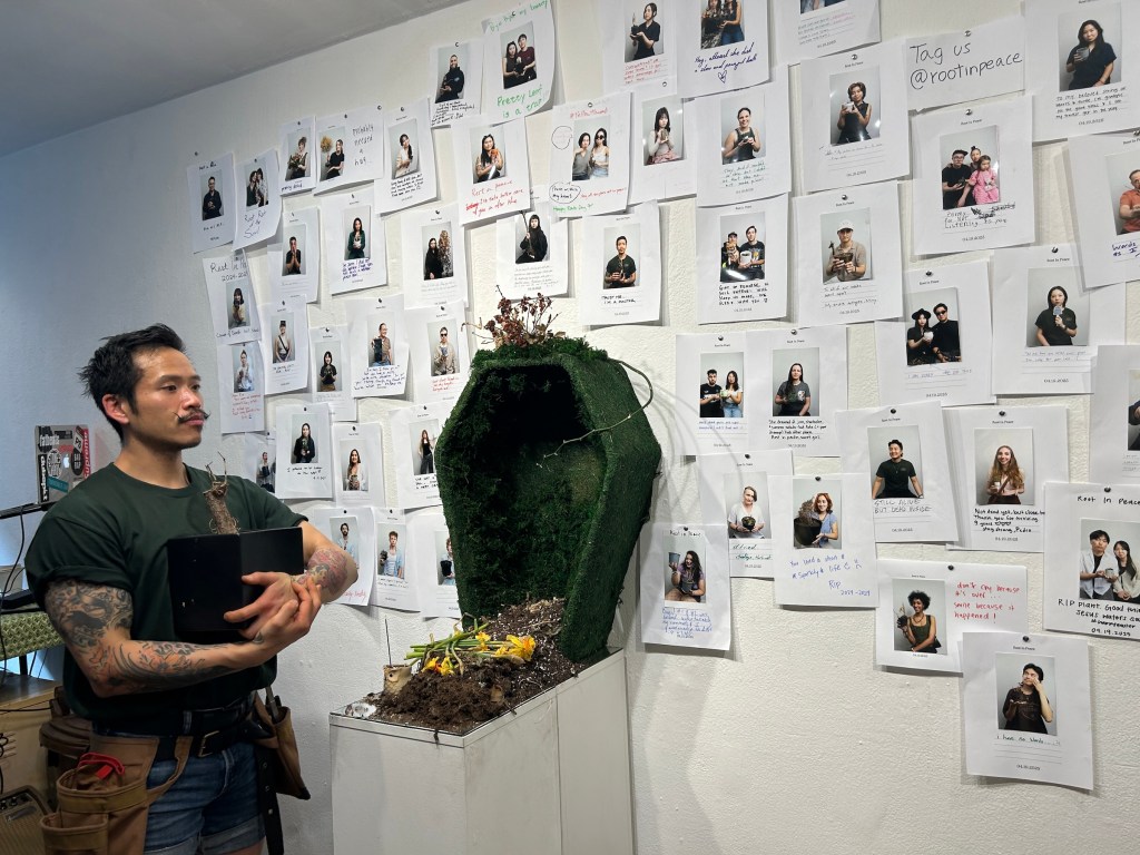 Richard Pham，founder of the Brooklyn-based business Plant Daddy MD，at the “plant funeral” at Chinatown Soup in Manhattan. (all photos Maya Pontone/Hyperallergic)